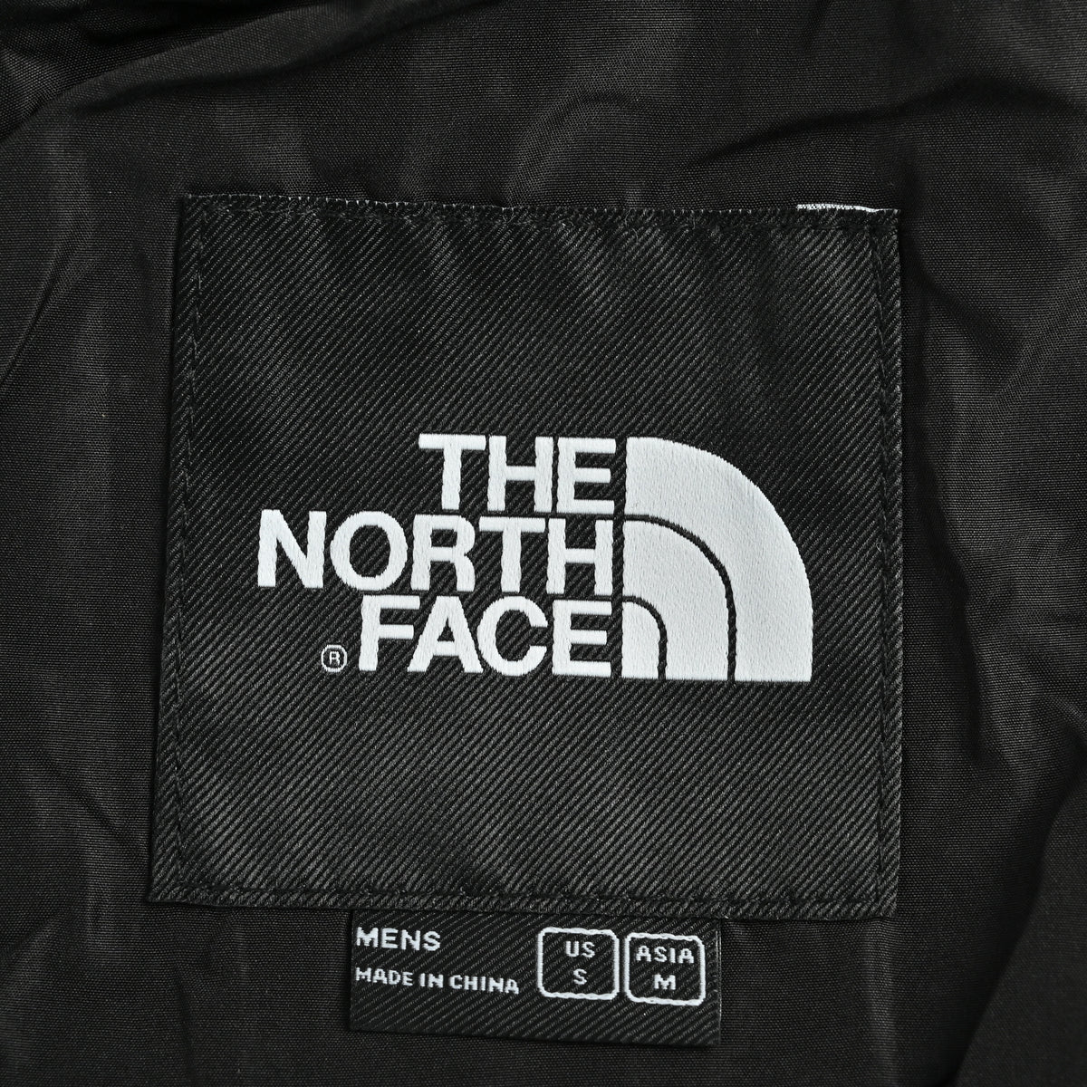 The North Face Embroidered Logo Concealed Hood Shell Jacket – Black  DK6400316